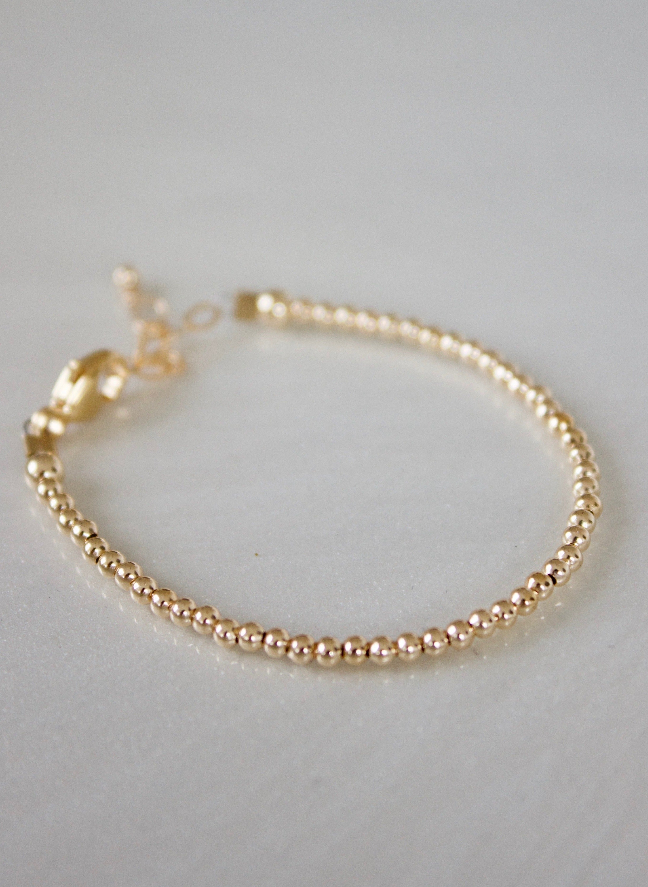  PETITE GOLD BABY BRACELET